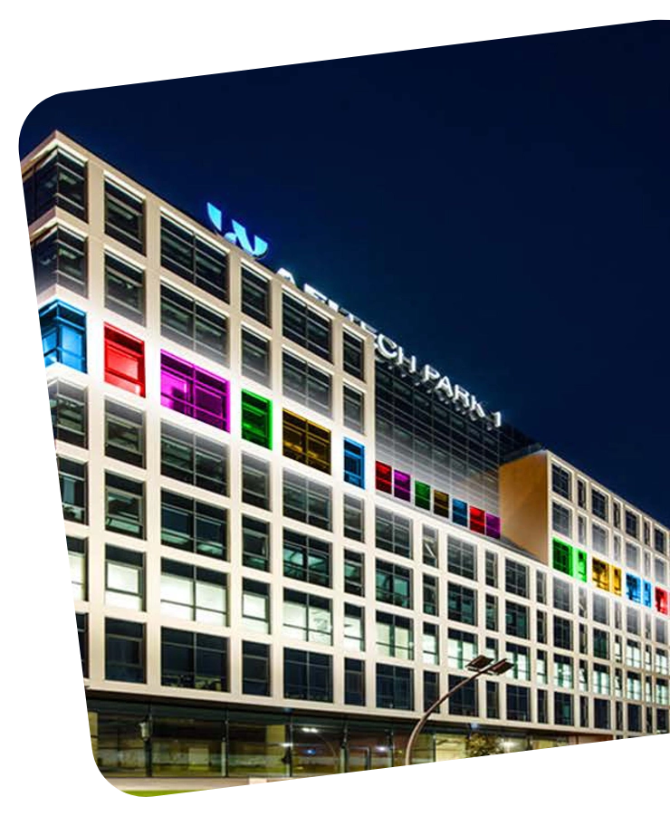 Afi Tech Park headquarters building at night